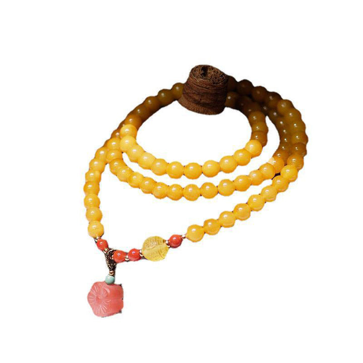 Collier d'équilibre et de guérison en ambre, bracelet à breloques en forme de fleur