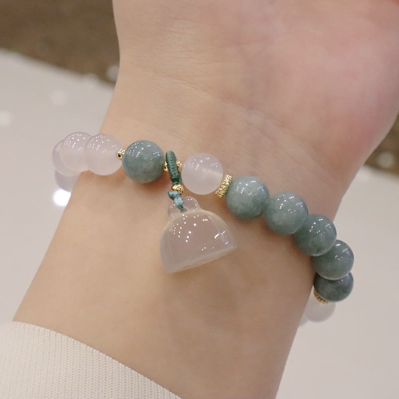 Bracelet de protection avec boucle de paix en Buddha Stones et jade blanc et fleur de lotus