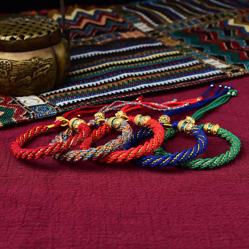 Bracelet tibétain en corde tressée avec breloque porte-bonheur Thangka en Buddha Stones