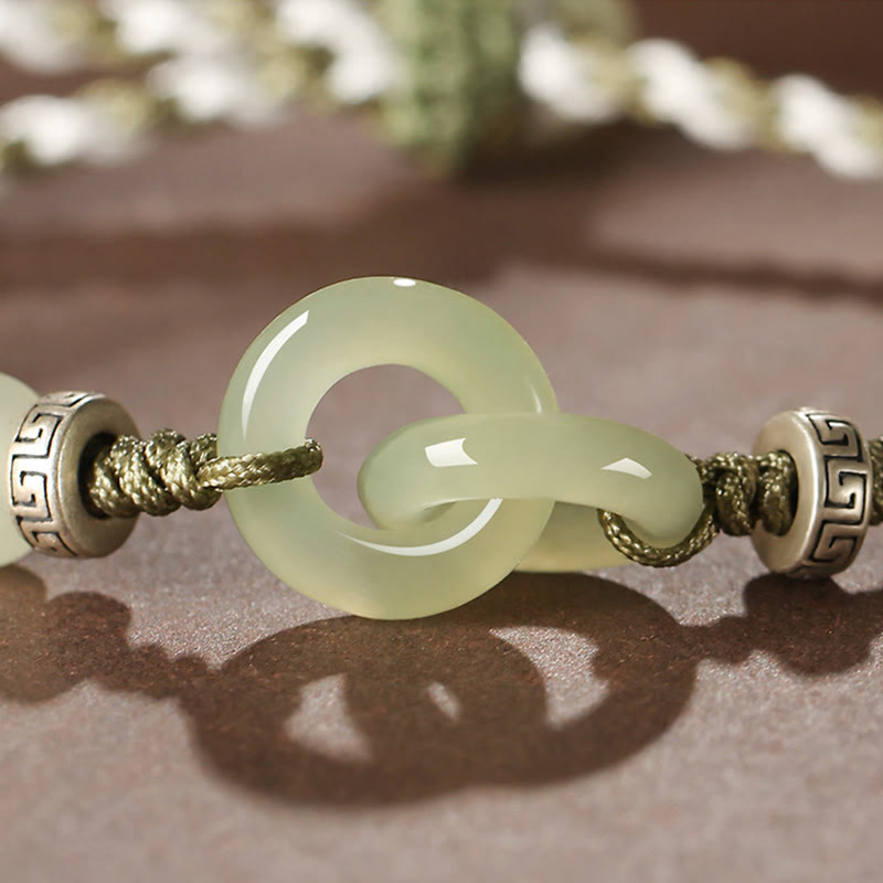 Bracelet tressé avec boucle de paix et porte-bonheur en jade naturel Hetian de Buddha Stones