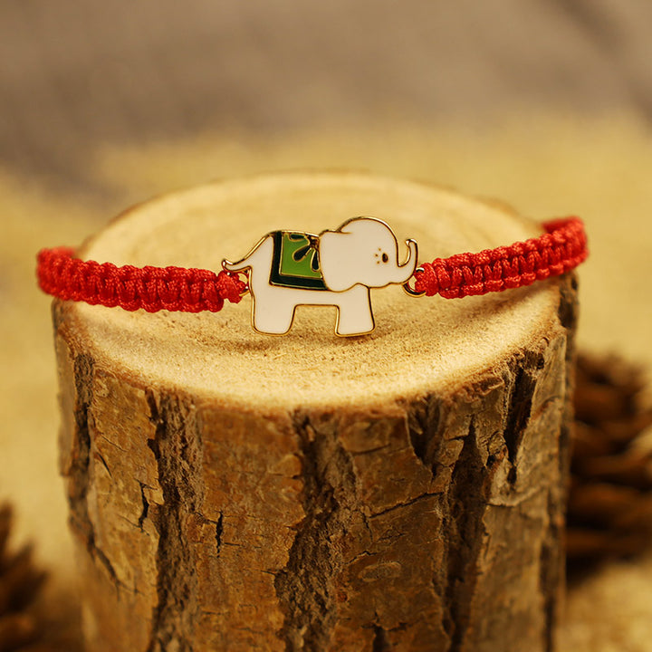 Bracelet tibétain en argent sterling 925 fait main avec des Buddha Stones et un éléphant porte-bonheur rouge