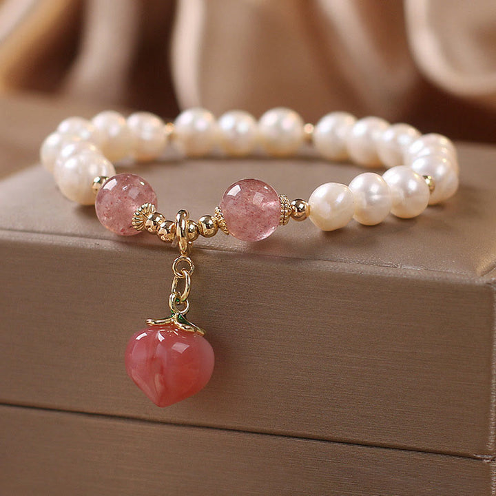 Bracelet à Buddha Stones en perles naturelles et quartz fraise, pêche, amour, cœur, sagesse