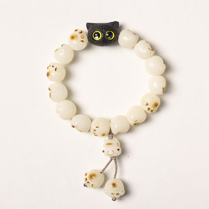 Bracelet de sagesse porte-bonheur en bois d'ébène avec de belles pattes et des graines de Bodhi naturelles de Buddha Stones - Graine de Bodhi blanche - Version pompon (tour de poignet 14-15 cm) - image 18