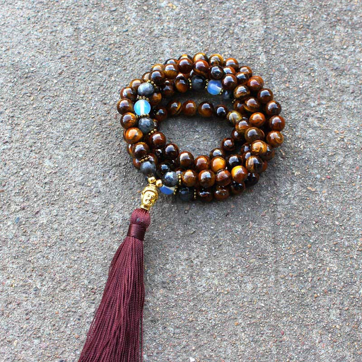 Collier avec pendentif en perles et pompon en œil de tigre tibétain Buddha Stones