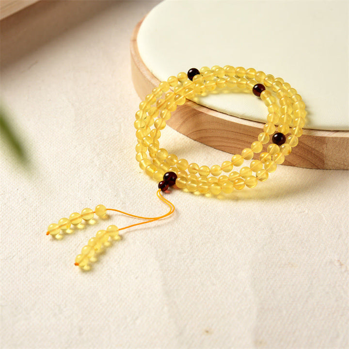 Bracelet Mala Buddha Stones 108 perles en ambre naturel transparent pour l'anxiété