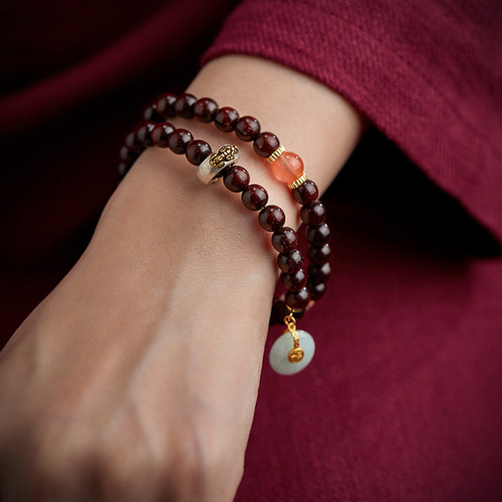 Buddha Stones Zodiaque chinois Bouddha natal Petite feuille Bois de santal rouge Jade Agate rouge Bracelet apaisant PiXiu