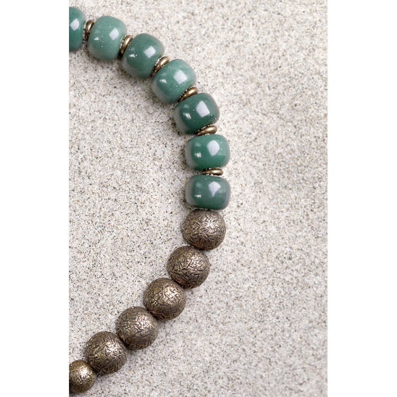 Bracelet tibétain en cuivre avec graines de Bodhi cyan