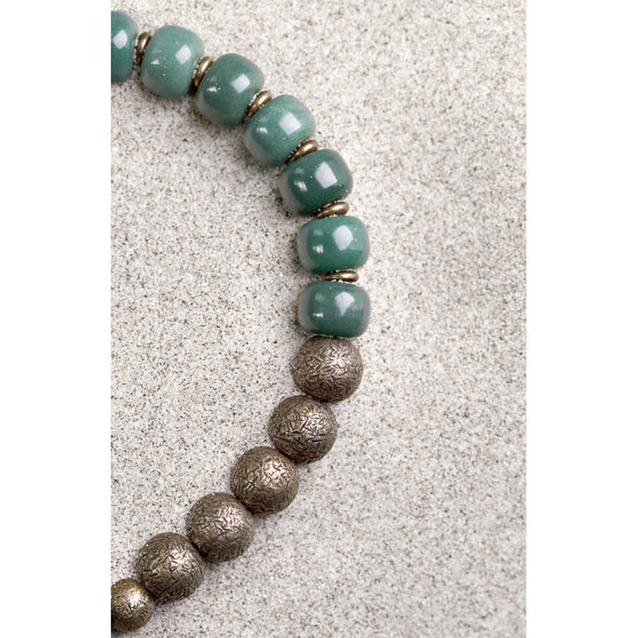 Bracelet tibétain en cuivre avec graines de Bodhi cyan