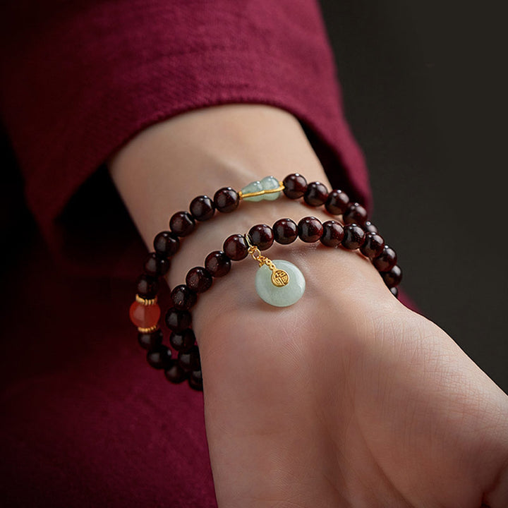 Buddha Stones Zodiaque chinois Bouddha natal Petite feuille Bois de santal rouge Jade Agate rouge Bracelet apaisant PiXiu