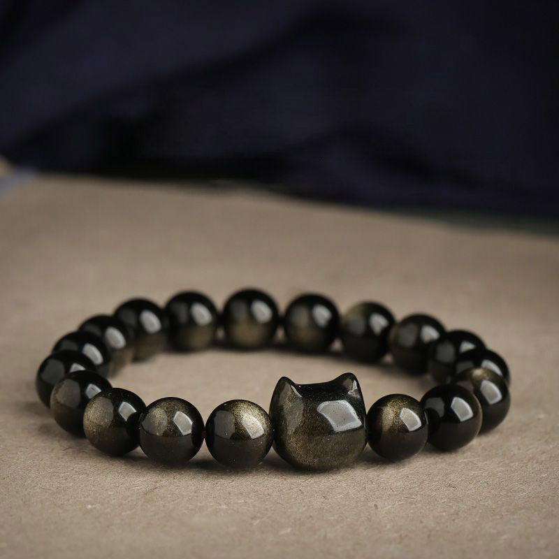 Bracelet de protection porte-bonheur en obsidienne dorée et argentée avec Buddha Stones et jolie patte de chat porte-bonheur - Obsidienne à reflets dorés - Tête de chat - 8 mm - image 1