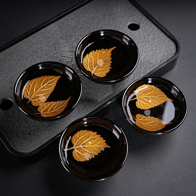Tasse à thé en céramique chinoise Jianzhan avec feuilles d'érable dorées et Buddha Stones