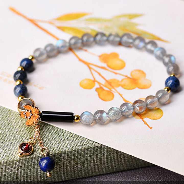 Bracelet apaisant et positif en Buddha Stones, pierre de lune, lazurite et lapis-lazuli - image 4