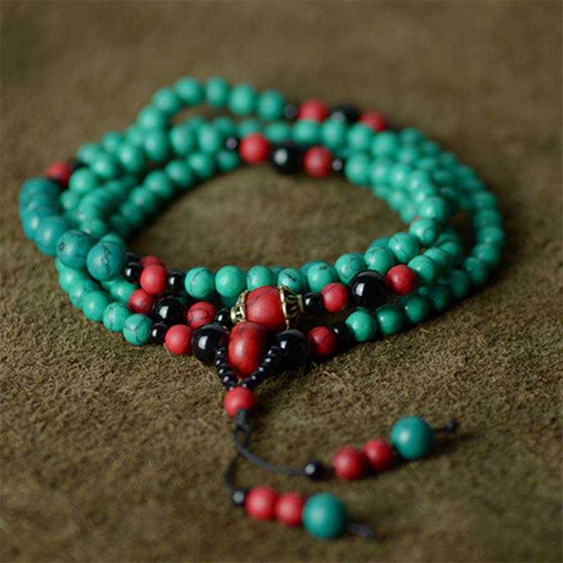 Bracelet de protection en perles de turquoise rouge et onyx noir Buddha Stones