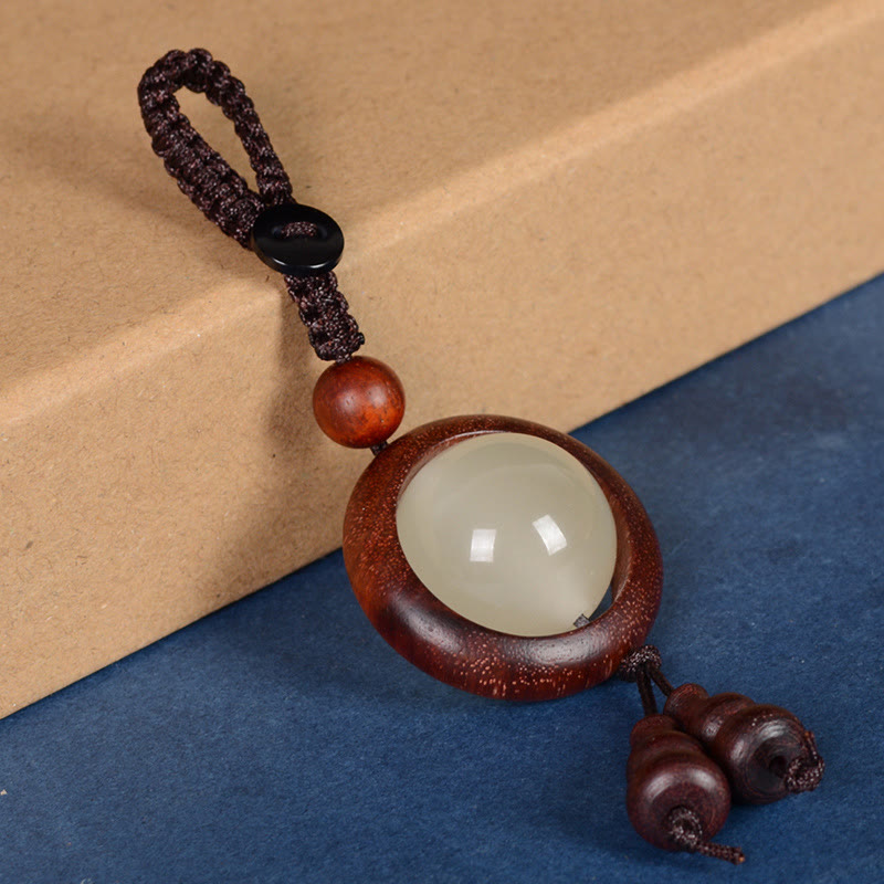 Porte-clés porte-bonheur lumineux en Buddha Stones en bois de santal rouge et bois d'ébène en bois de santal vert