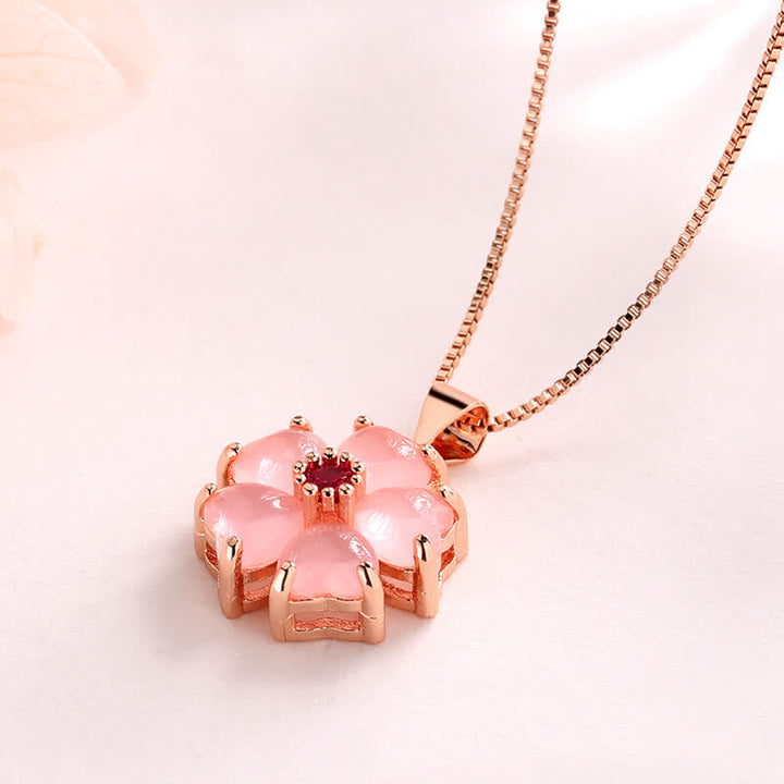 Collier avec pendentif apaisant en forme de cœur et de fleur en cristal rose de Buddha Stones