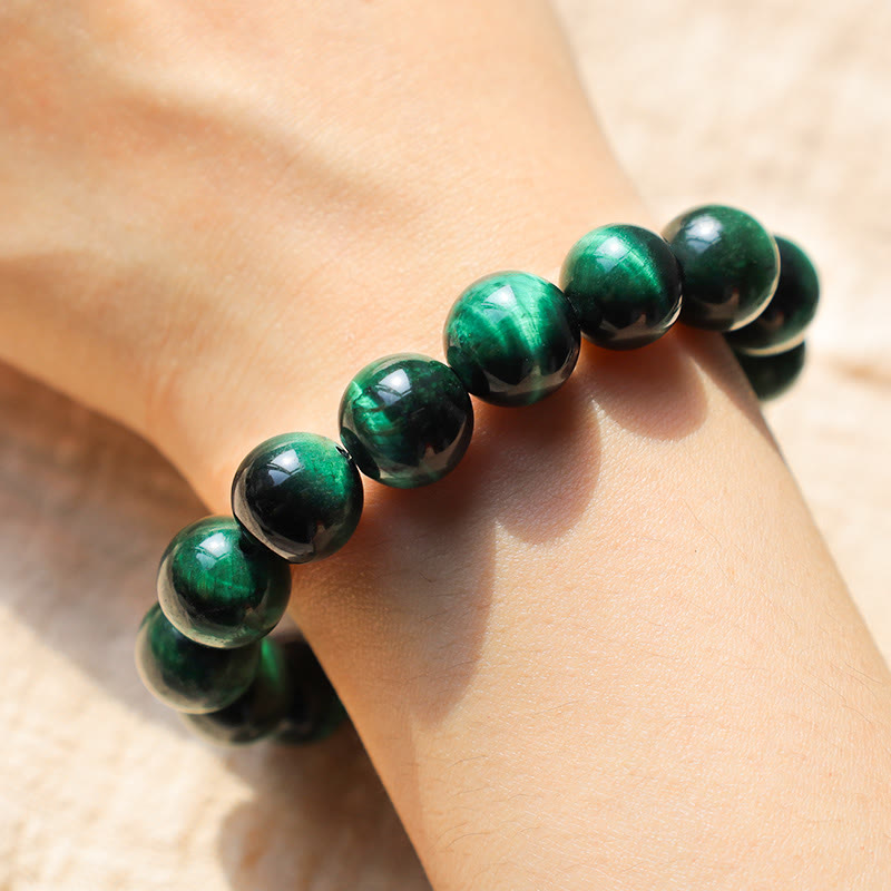 Bracelet énergétique de guérison et de croissance en œil de tigre Buddha Stones