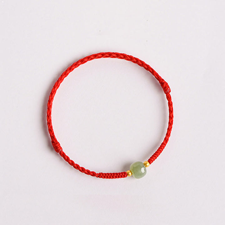 Bracelet tressé en perles de jade porte-bonheur et prospérité fait main avec Buddha Stones