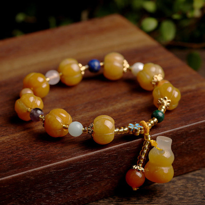 Bracelet de richesse Pixiu en jade et soie dorée avec Buddha Stones