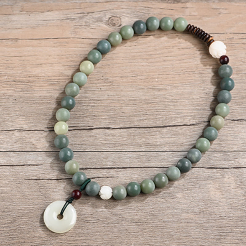 Bracelet double tour en jade et pierre de Buddha Stones avec boucle de paix et sagesse