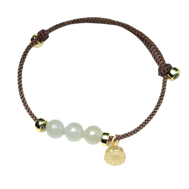 Bracelet tissé en fil rouge avec des Buddha Stones et des graines de lotus en jade naturel