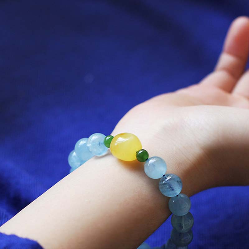 Bracelet de guérison et de sérénité en perles d'ambre et d'aigue-marine naturelles