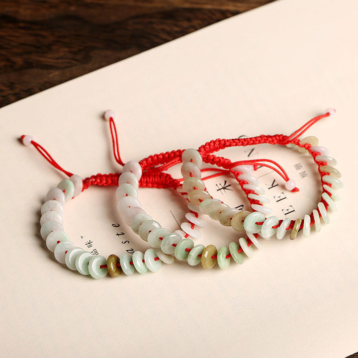 Bracelet de protection en fil rouge Buddha Stones en jade rond naturel