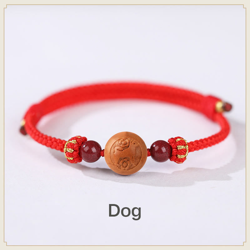 Bracelet de richesse en bois de pêche naturel Buddha Stones et caractère Fu du zodiaque chinois sculpté en cinabre