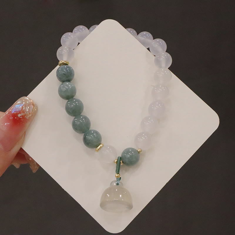 Bracelet de protection avec boucle de paix en Buddha Stones et jade blanc et fleur de lotus