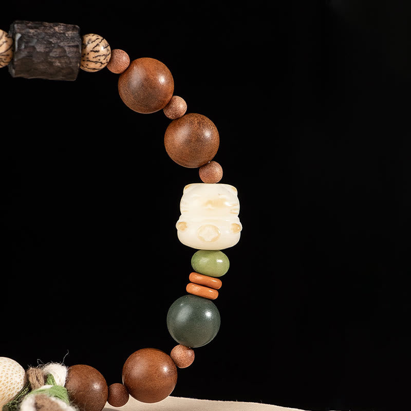 Bracelet à pompon en bois avec Buddha Stones et foudre, graine de Bodhi, patte de chat, griffe, protection de bon augure - image 4