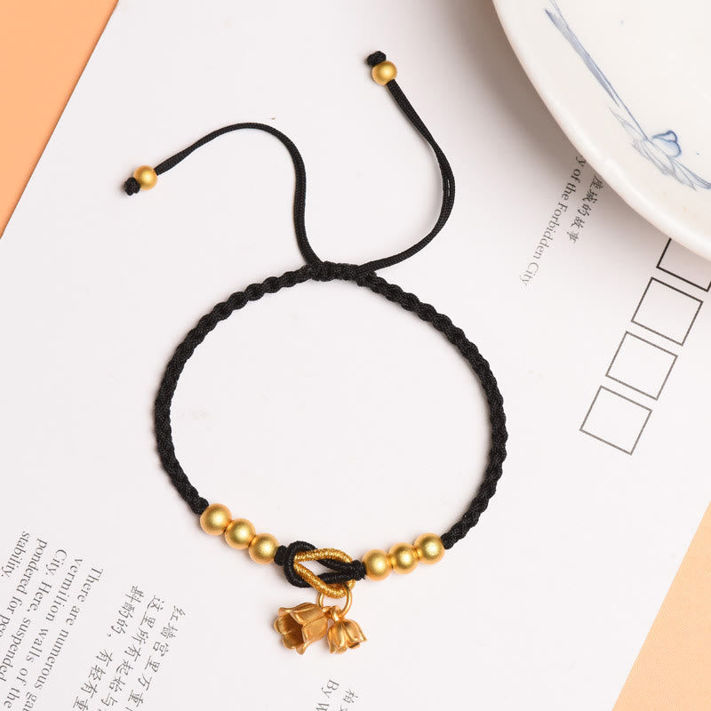 Bracelet tressé fait main en forme de fleur de muguet avec breloque de Buddha Stones