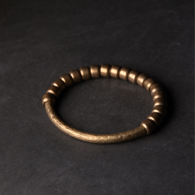 Bracelet porte-bonheur en perles de cuivre et de laiton au design simple Buddha Stones