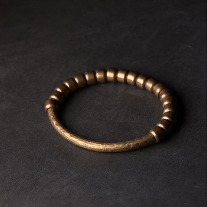 Bracelet porte-bonheur en perles de cuivre et de laiton au design simple Buddha Stones