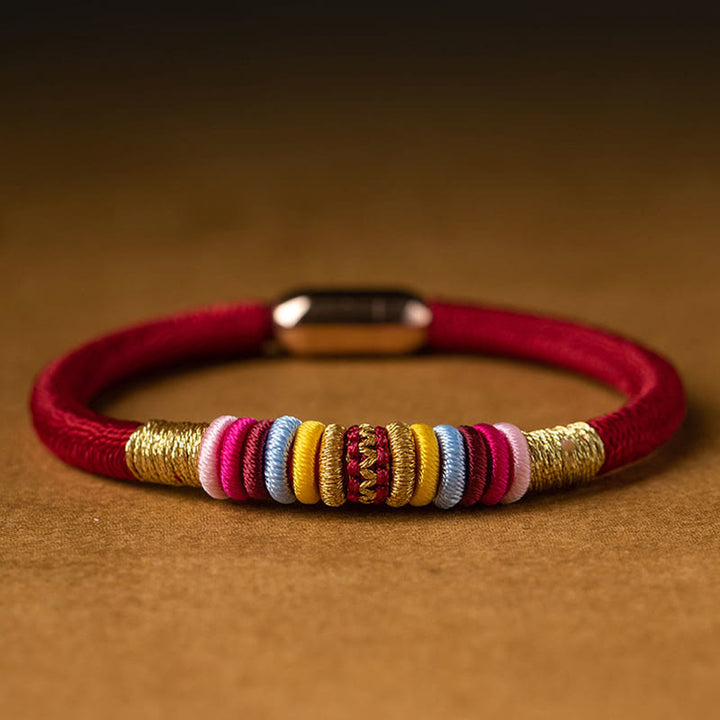 Bracelet tressé à boucle magnétique en Buddha Stones tibétaines fait à la main avec protection des nœuds King Kong
