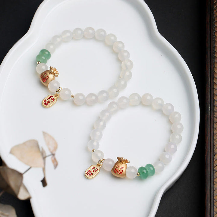 Buddha Stones Agate blanche naturelle Agate rouge Sac d'argent Caractère Fu Trèfle à quatre feuilles Bracelet de protection