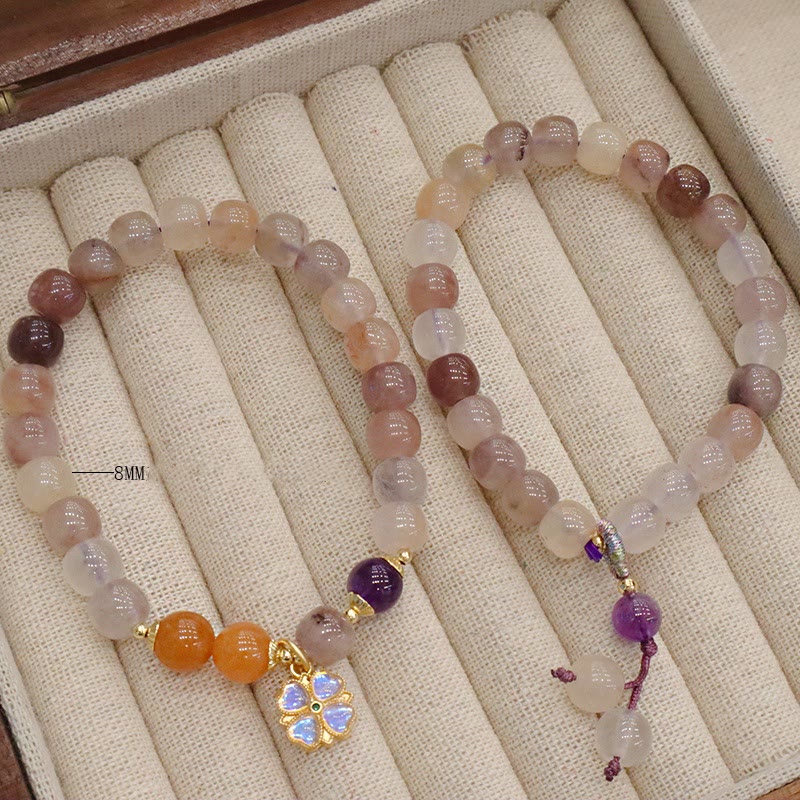Bracelet de richesse en perles de jade violet doré en Buddha Stones