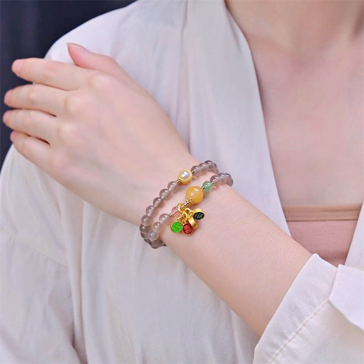 Bracelet double tour en agate grise naturelle avec breloque paix et joie et Buddha Stones