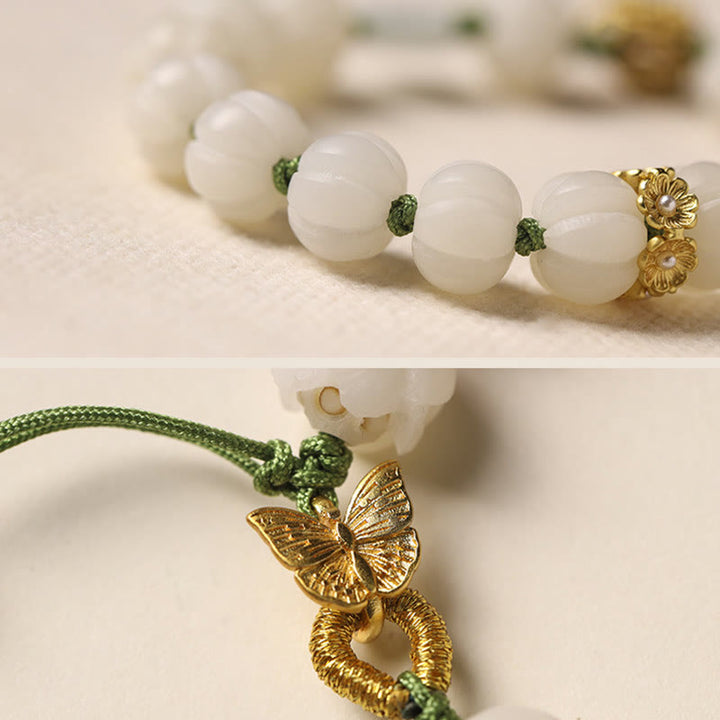 Bracelet d'harmonie et de paix en perles de citrouille et de lotus en Buddha Stones naturelles