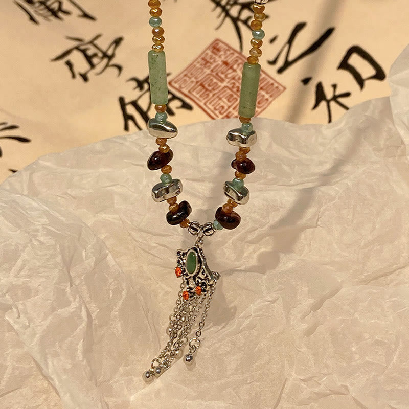 Collier pendentif pompon porte-bonheur en cuivre avec pierres de cristal tibétaines de Buddha Stones