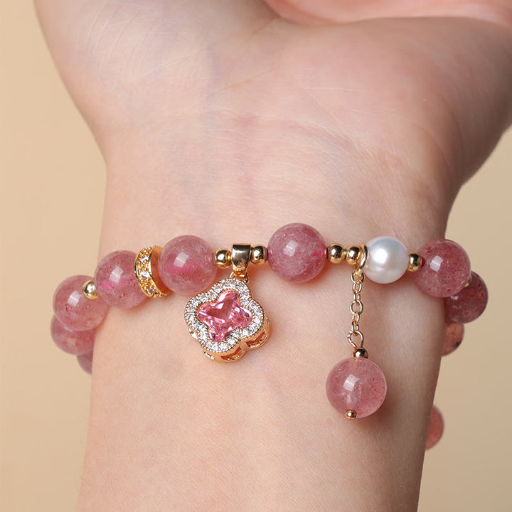 Bracelet de guérison à breloques en trèfle à quatre feuilles avec perles de quartz fraise et Buddha Stones