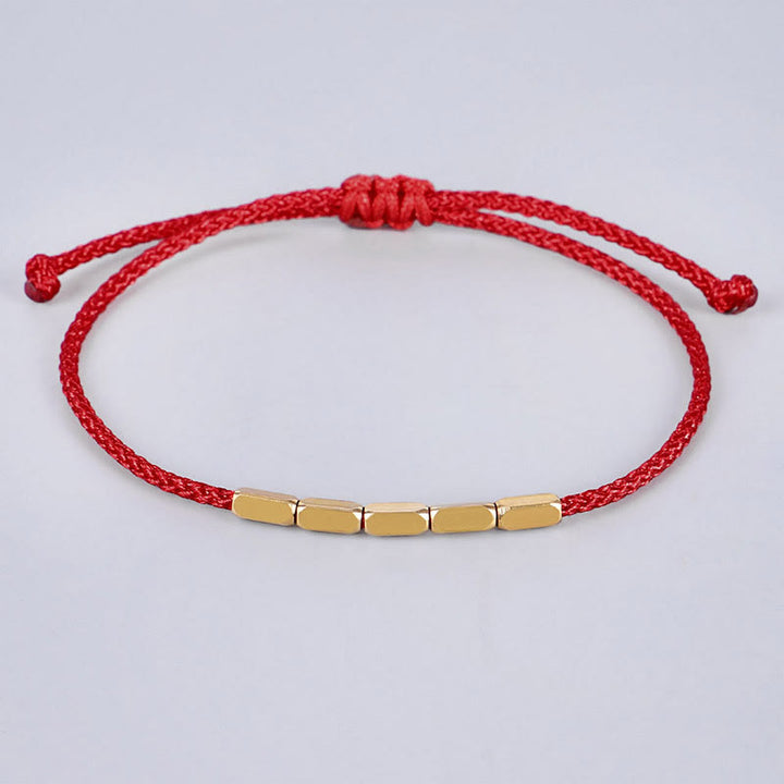 Bracelet tressé de protection en perles de cuivre fabriquées à la main par Buddha Stones