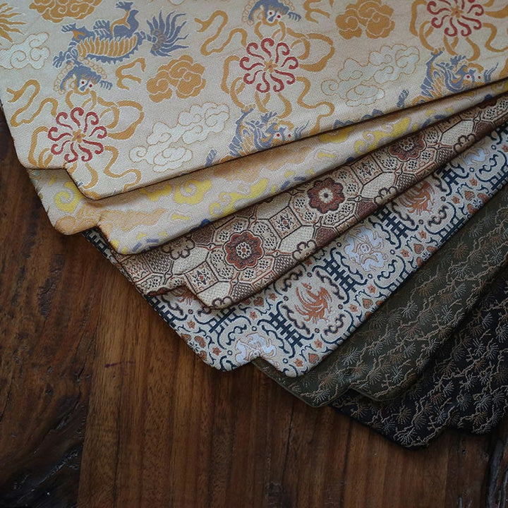 Dessous de verre élégant à motif de brocart floral pour tasse à thé