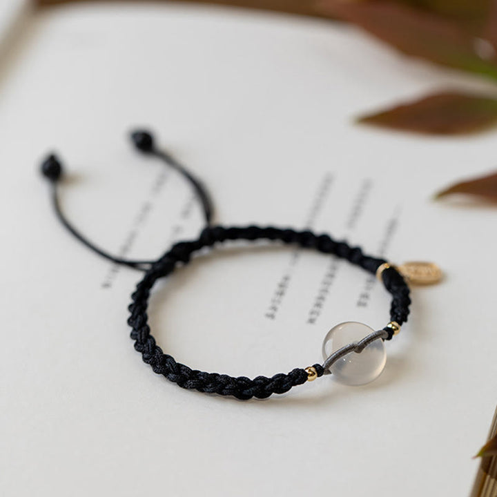 Bracelet en corde positive avec boucle ronde en calcédoine et Buddha Stones