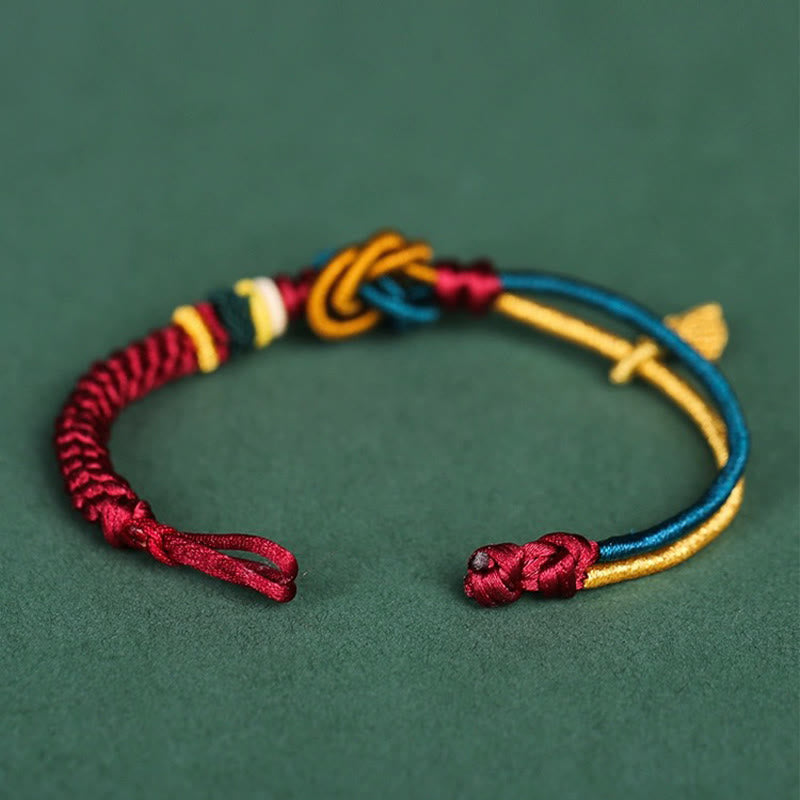 Bracelet tibétain en corde porte-bonheur fait main avec nœud mandala et Buddha Stones