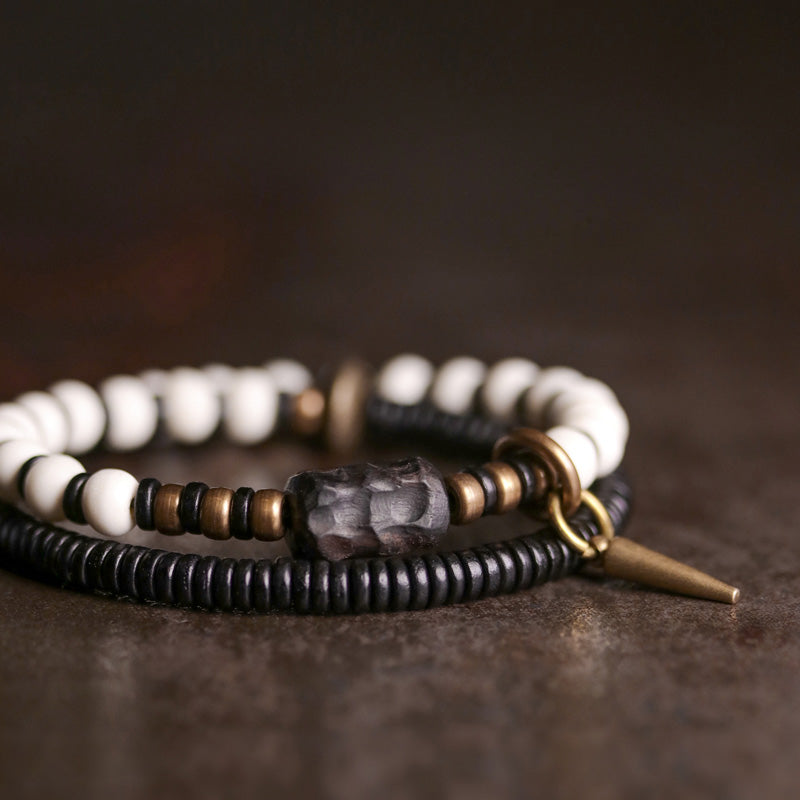 Bracelet couple force en bois d'ébène et cuivre, perles d'os et Buddha Stones