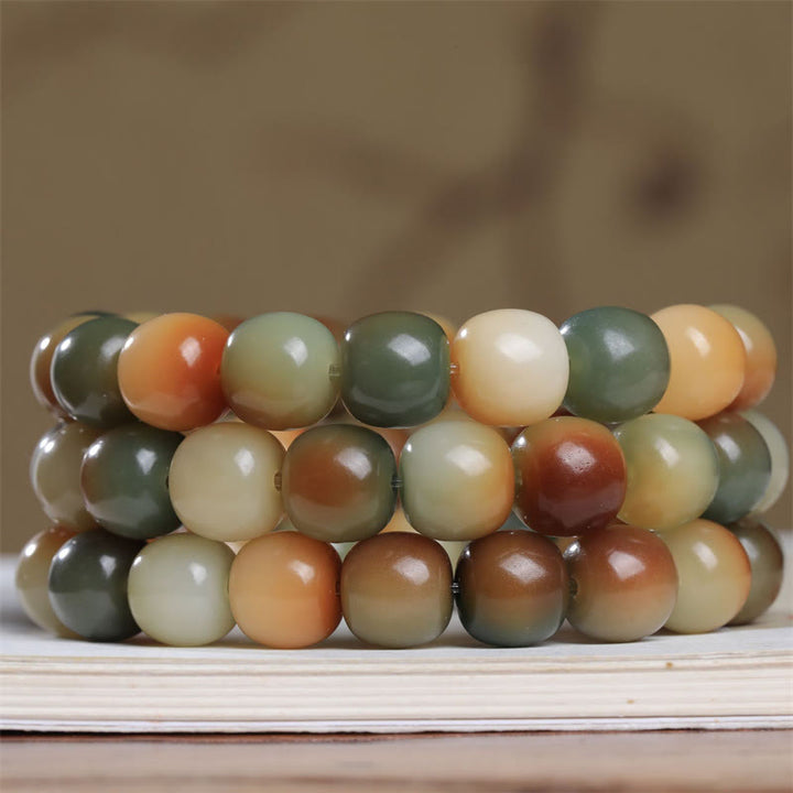 Bracelet de sagesse et de paix avec graines de Bodhi colorées et Buddha Stones