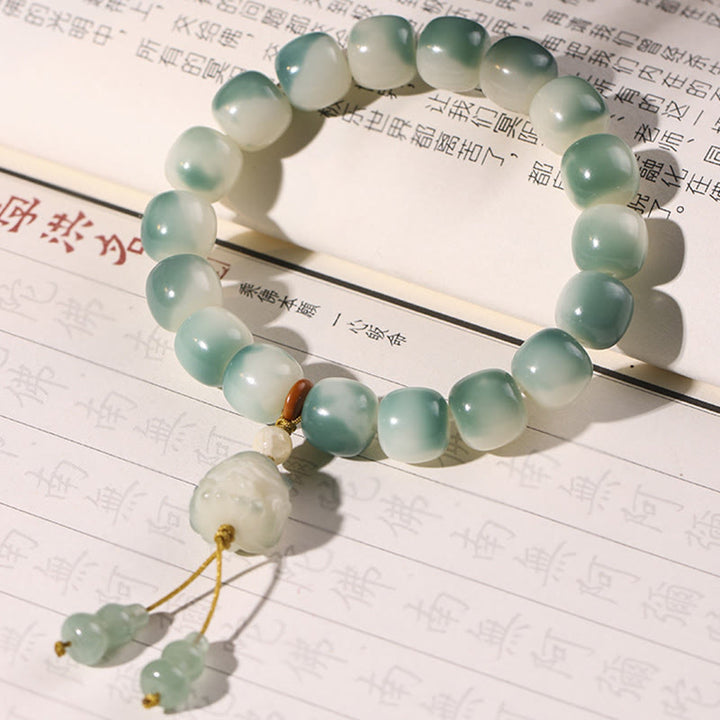 Bracelet de paix en forme de pomme de pin et de patte de chat, motif de Buddha Stones dégradées, graines de Bodhi, renard à neuf queues - image 8