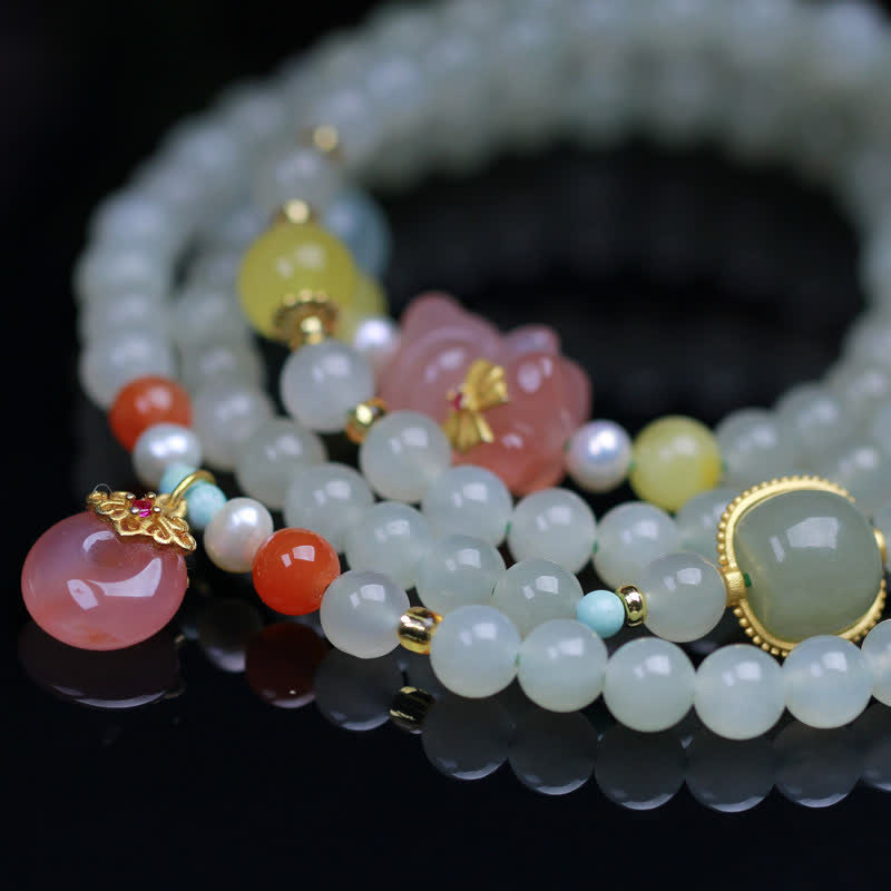 Bracelet en Buddha Stones en jade Hetian naturel avec cristal rose et boucle de paix pour le bonheur et l'abondance