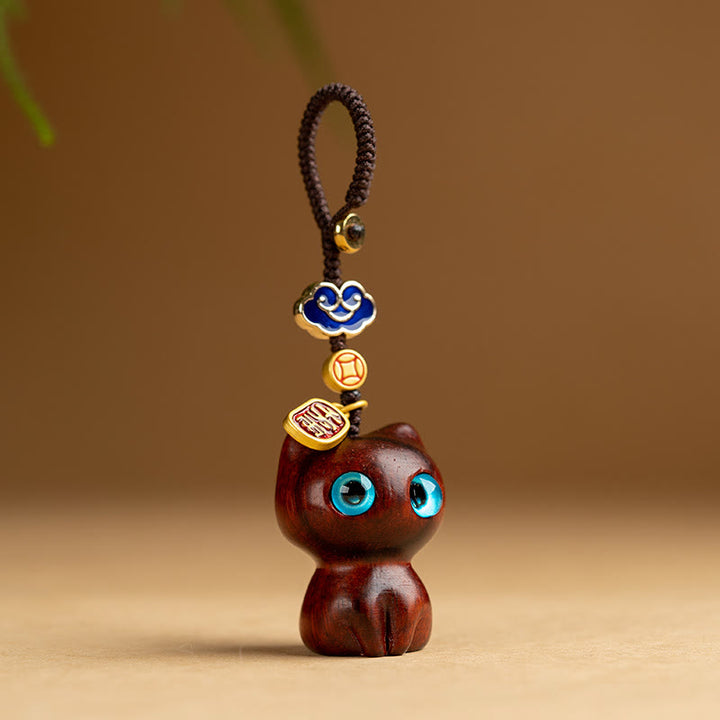 Porte-clés de protection en bois de santal rouge et ébène avec petites feuilles de Buddha Stones, porte-clés pour téléphone, décoration à suspendre - Chat en bois de santal rouge à petites feuilles - Porte-clés - image 1