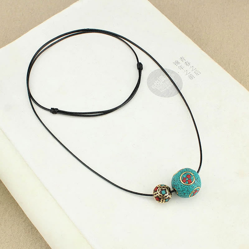 Collier avec Buddha Stones et double perle turquoise tibétaine pour la protection et la force