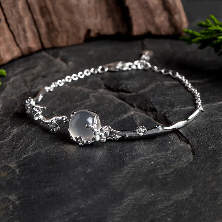 Bracelet positif en calcédoine et fleur de prunier avec Buddha Stones